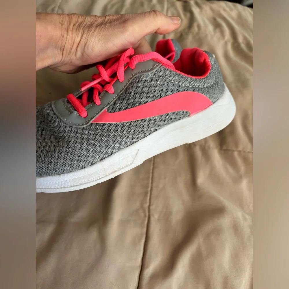 Athletic Works.  Tennis shoes. Still have some play time in them. Size‎ 3